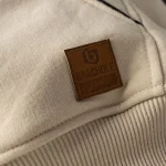 Damska bluza kangurka oversize w kolorze kremowym Brachole