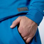 Turkusowe spodnie dresowe męskie z kieszeniami joggery